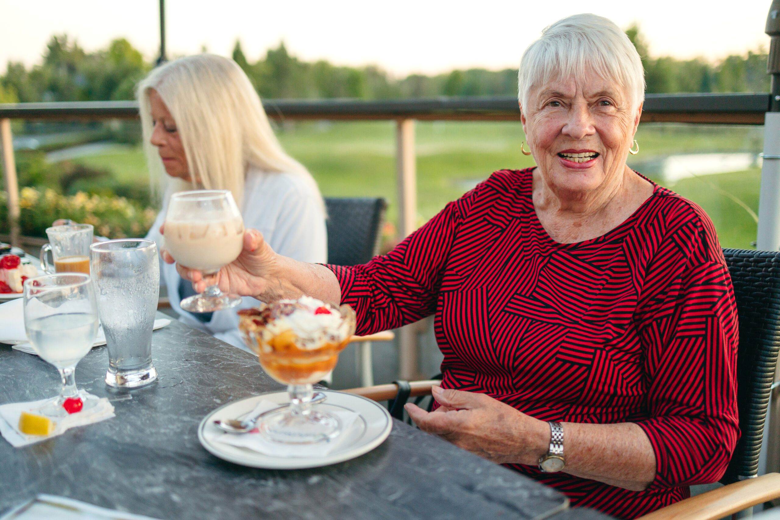 Alice Samworth with dessert and digestif